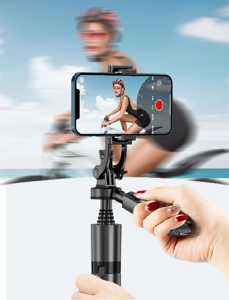 Black phone holder on tripod with mounted smartphone and a hand-held controller