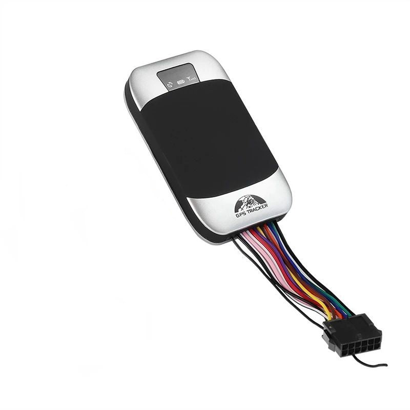 Compact vehicle GPS tracker with black and silver body and attached wiring connector