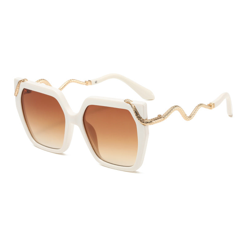 Square white sunglasses with brown gradient lenses and gold snake temple detailing