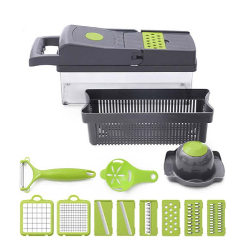 Compact gray vegetable slicer with clear container and green blade attachments