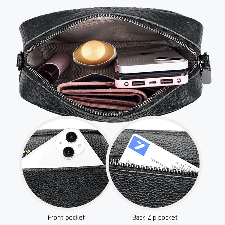 Black crossbody bag interior view showing zipper compartments and elastic card holder