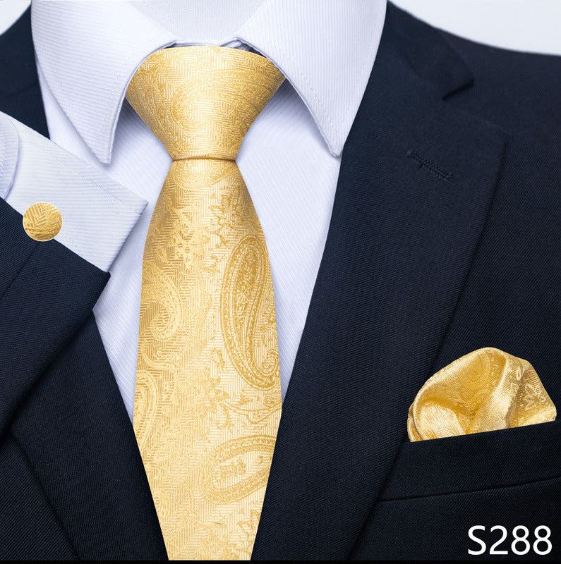 Men's formal gold patterned tie set with matching pocket square and cuff link
