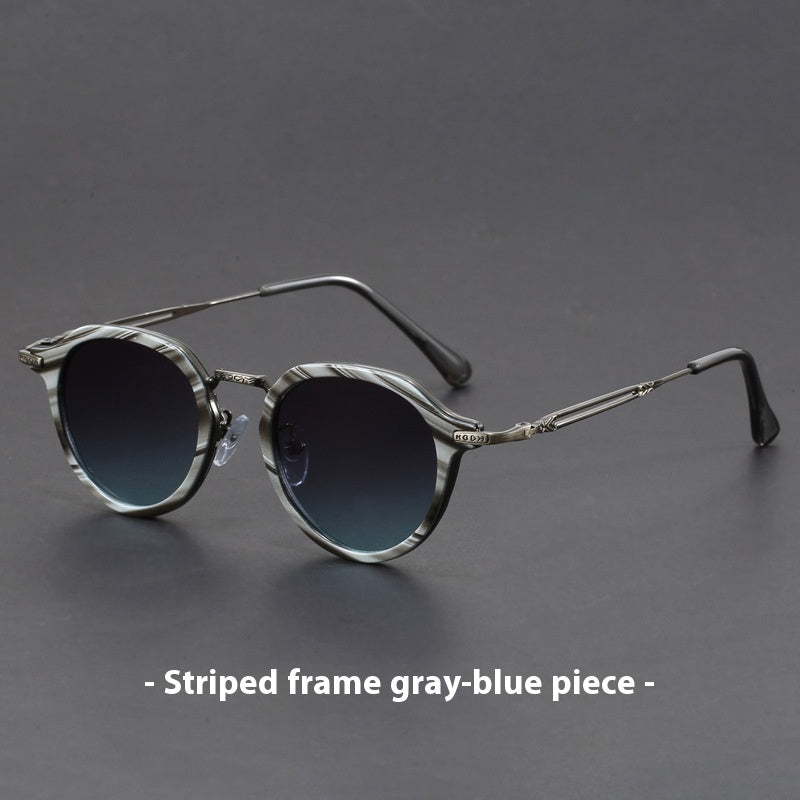 Unisex round metal sunglasses with gray-blue striped frames and dark lenses