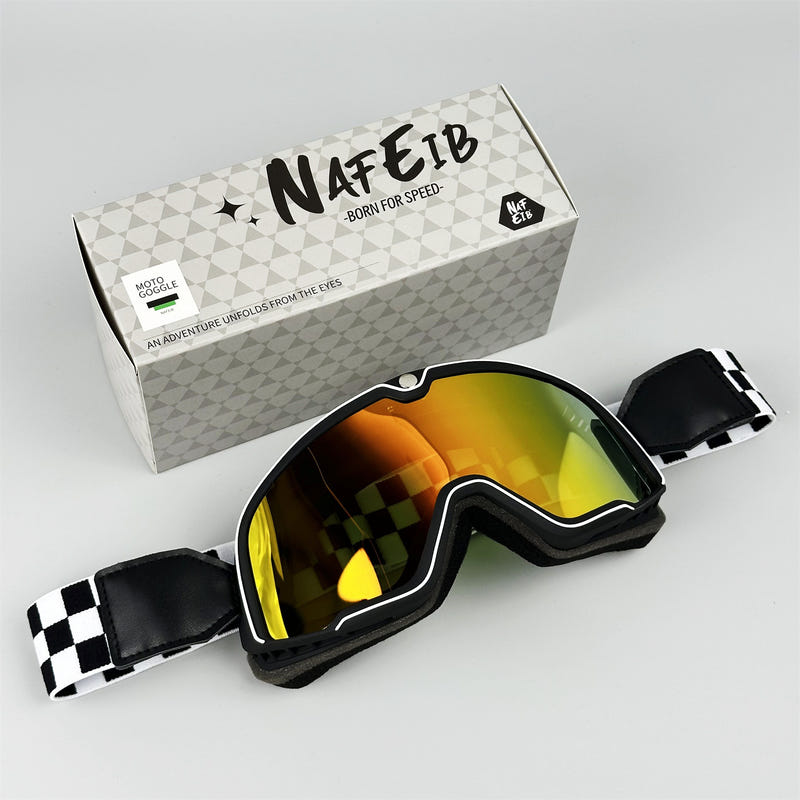 Black motorcycle goggles with rainbow reflective lens and adjustable strap