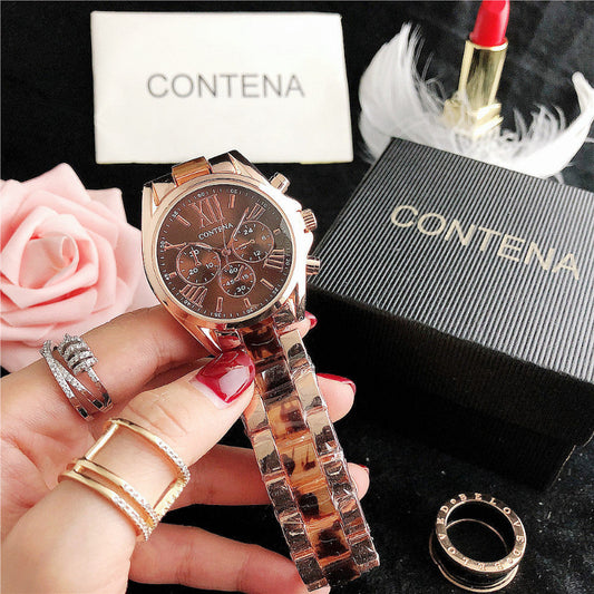 Rose gold watch with tortoiseshell strap held by a hand, surrounded by roses and a Contena box.