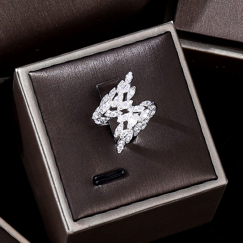 Zircon cross-shaped ring with floral detailing, in a square gift box