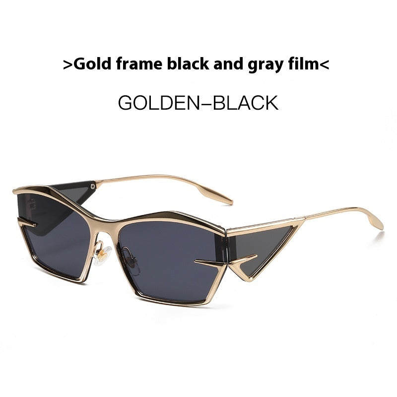 Gold-framed sunglasses with dark black-gray tinted lenses and angular full rims