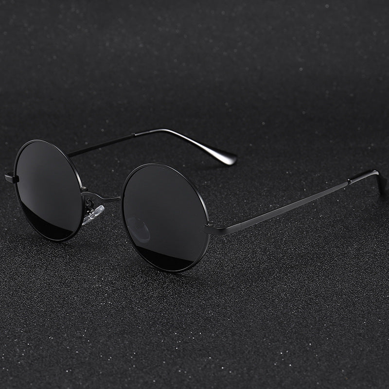 Classic polarized round sunglasses with black frame and dark lenses