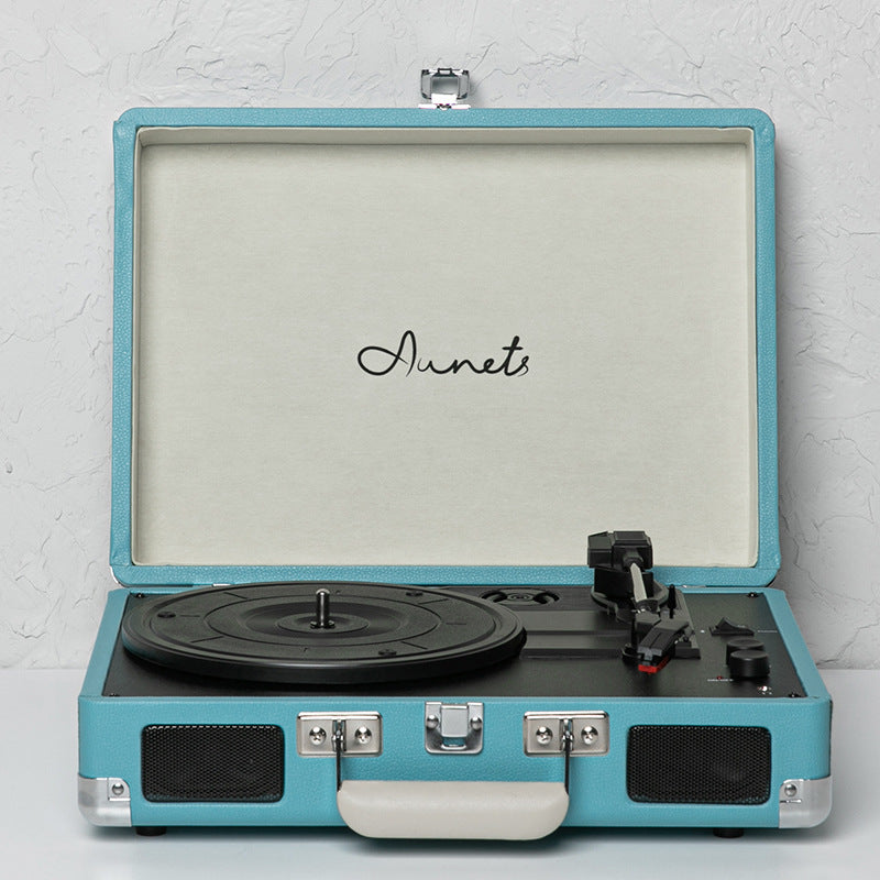 Lake blue portable Bluetooth record player phonograph with open lid and speakers