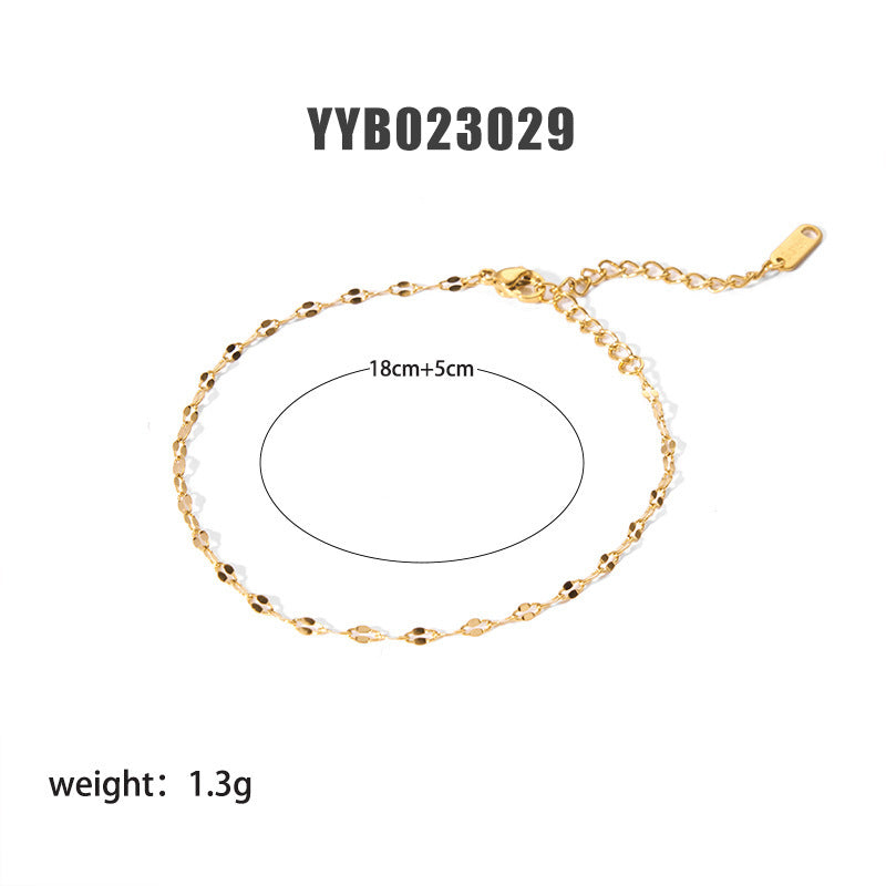 Gold-tone oval-link ornament bracelet with chain extender and small clasp