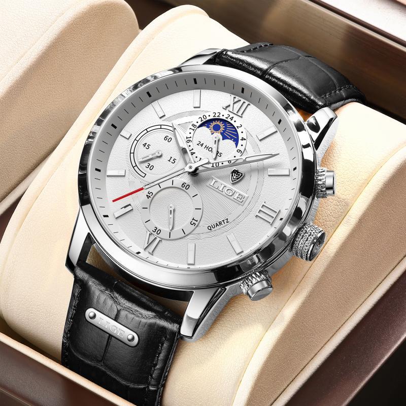 Silver chronograph quartz watch with white dial and black leather strap