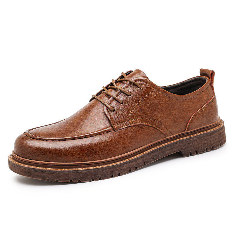 Brown lace-up low-top leather shoes with lace closure and chunky tread outsole