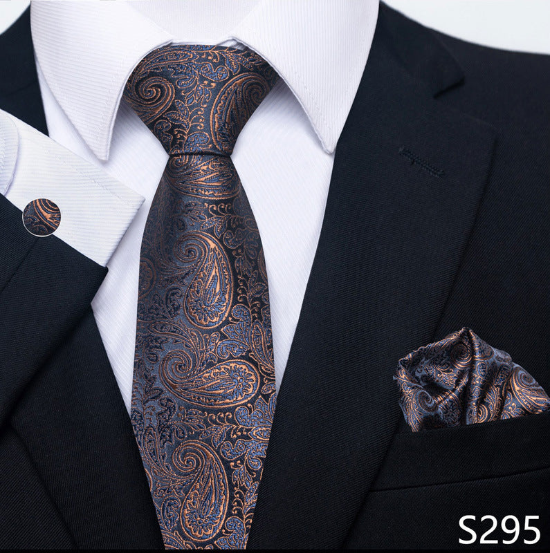 Men's formal navy paisley tie set with matching pocket square and cuff link