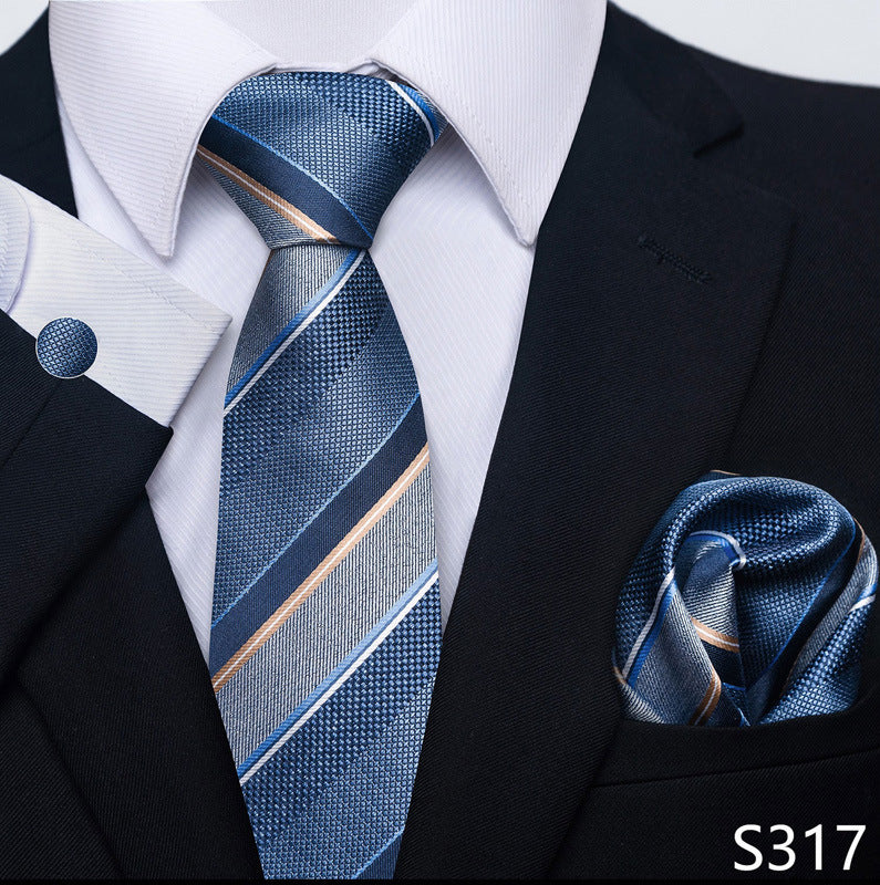 Blue striped tie set with matching pocket square and round cuff links.