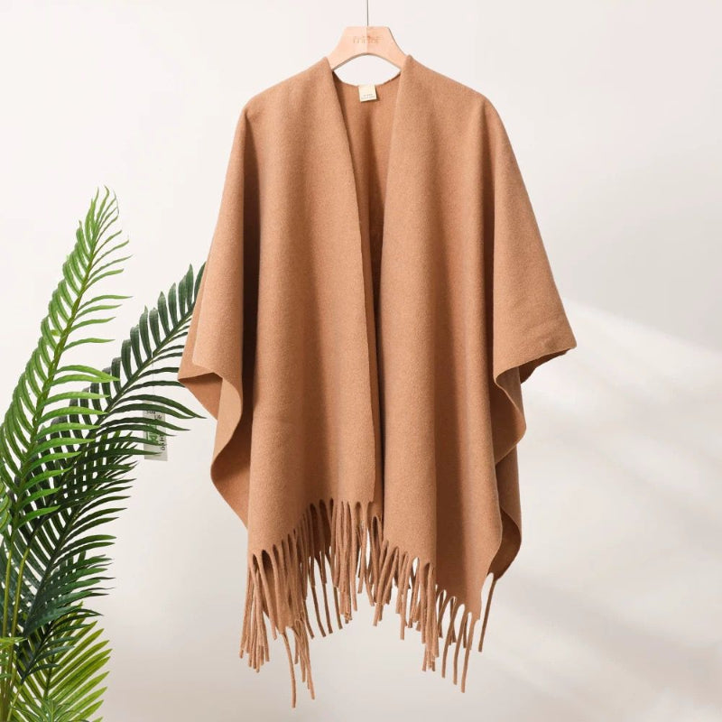 Camel brown tassel-fringe travel cape with draped front and open neckline
