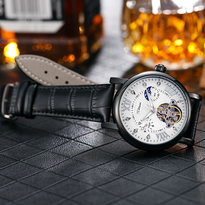 Mechanical watch with silver case, white dial with blue details, black leather strap
