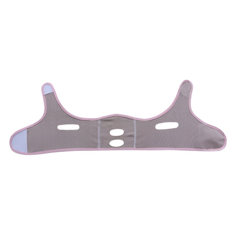 Flat face-shaping sleep mask with ear loops and cutouts for the nose and mouth