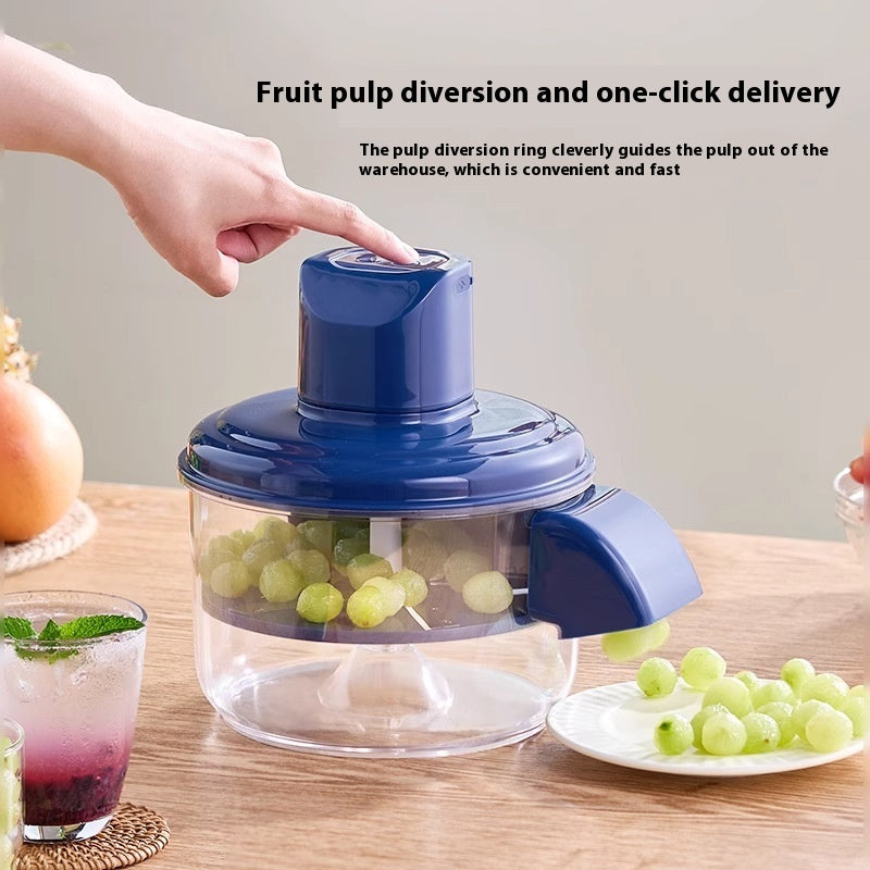 Blue electric grape peeler dispensing grapes from a clear container with control top