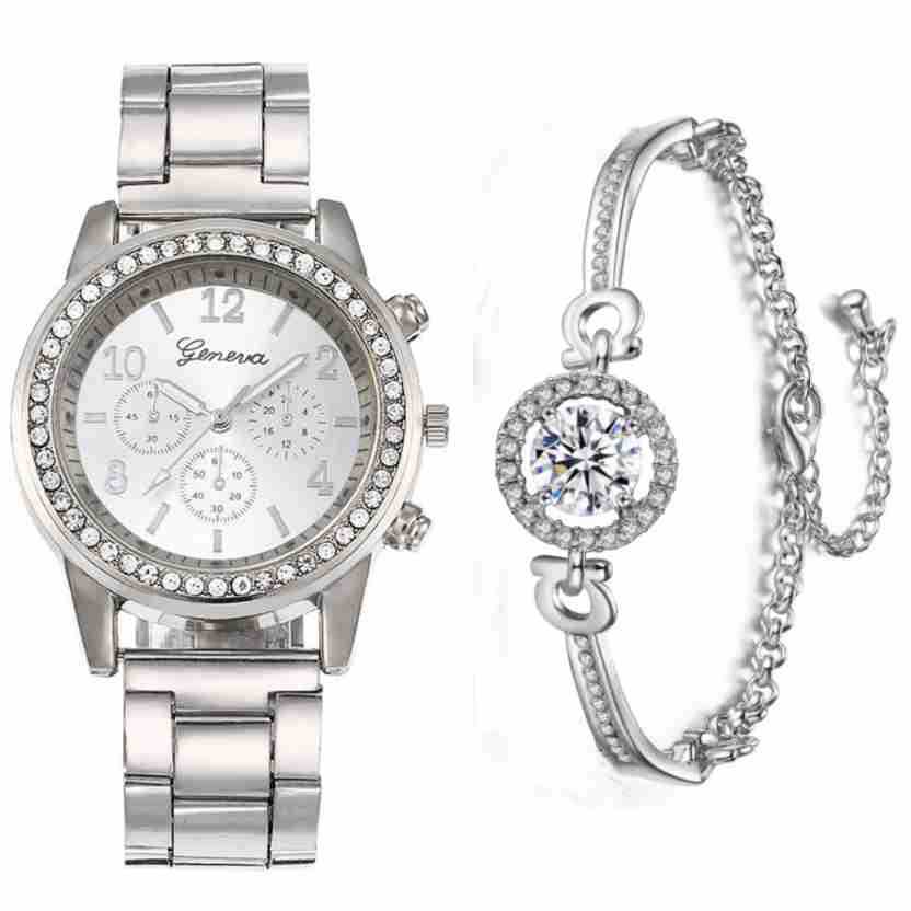 Silver watch and bracelet set on a white background