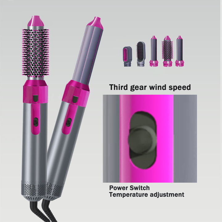 Hot air styling brush with pink handle controls and interchangeable roller head tips