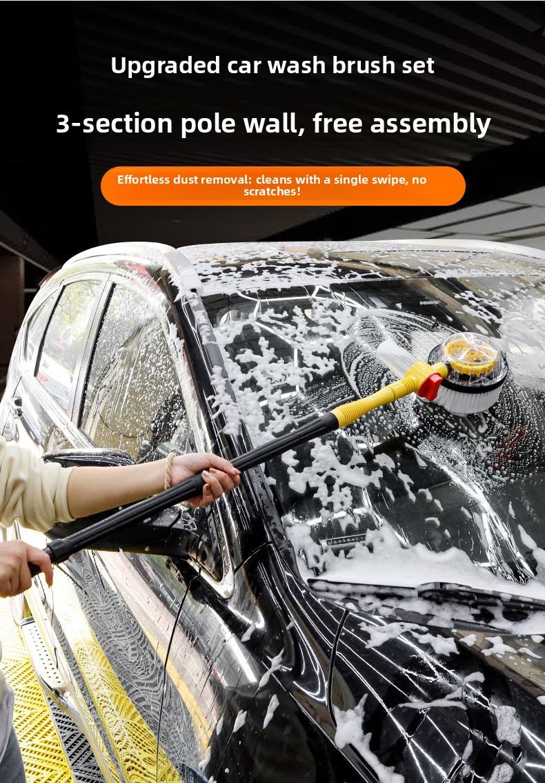 Long-handled rotating car wash brush cleaning a soapy vehicle