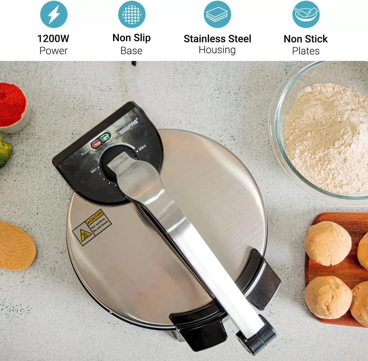 Electric roti maker with stainless steel housing, round plates and temperature dial