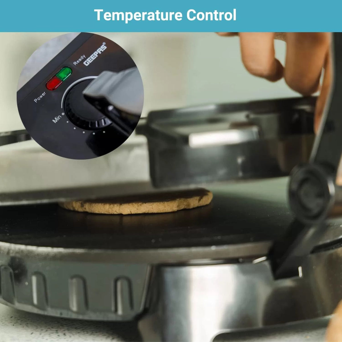 Electric roti maker with temperature dial and flatbread between the cooking plates