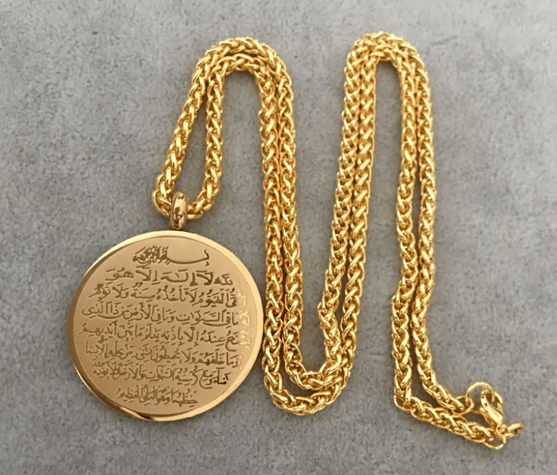 Gold Ayat al-Kursi pendant necklace with a round engraved medallion and braided chain