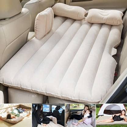 Beige car back seat air mattress with raised side supports and two pillows