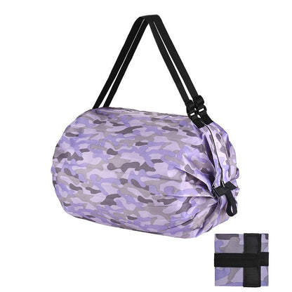 Purple camouflage bag with black strap on a white background