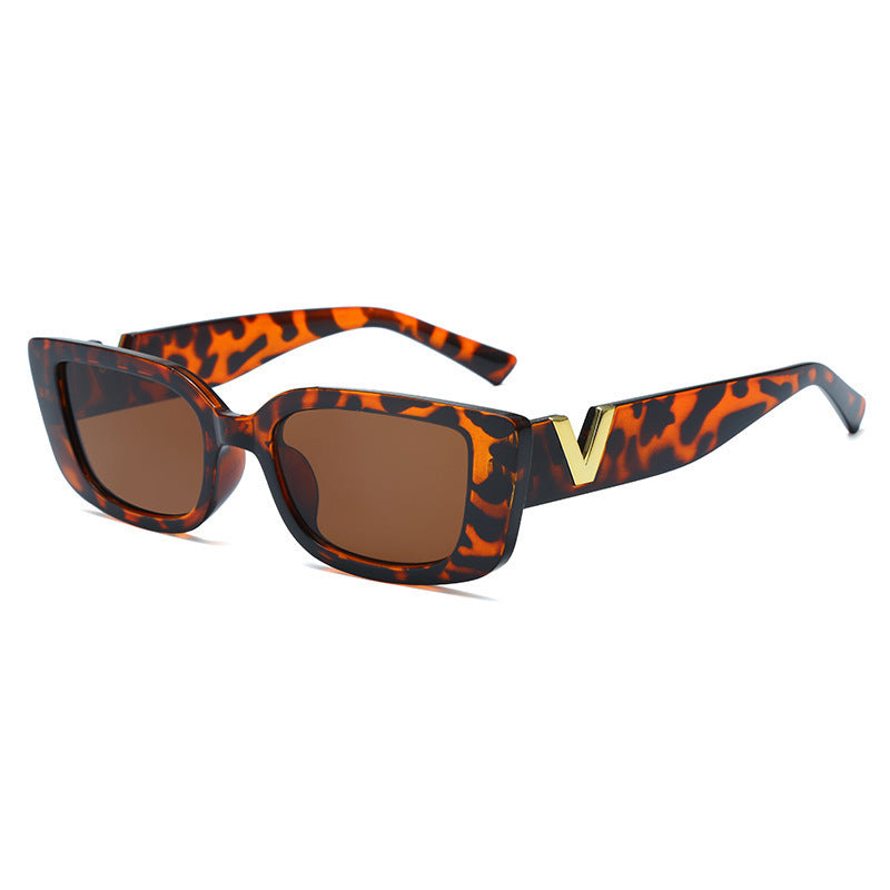 Square tortoiseshell sunglasses with brown lenses and gold V temple detail