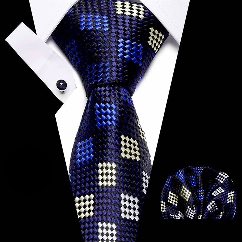Men's business tie in navy with checkered diamond weave pattern in blue and cream