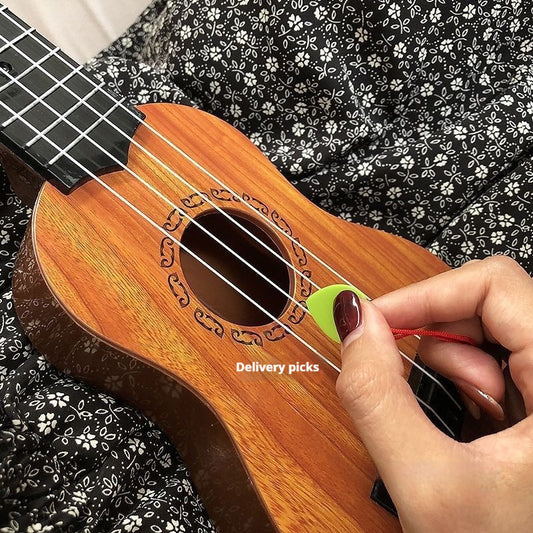 Person changing a ukulele string with a green string winder on a black floral background