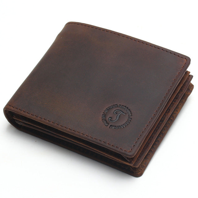 Dark brown leather men's short wallet with embossed emblem and visible card stack