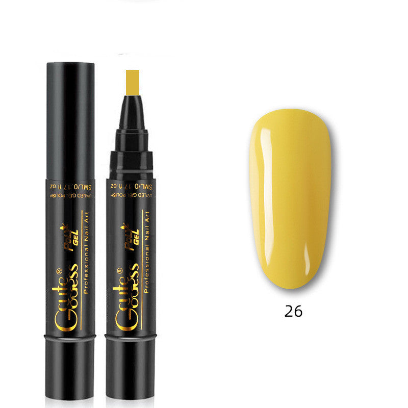 Yellow nail glue pen with applicator tip and yellow nail swatch, shade 26
