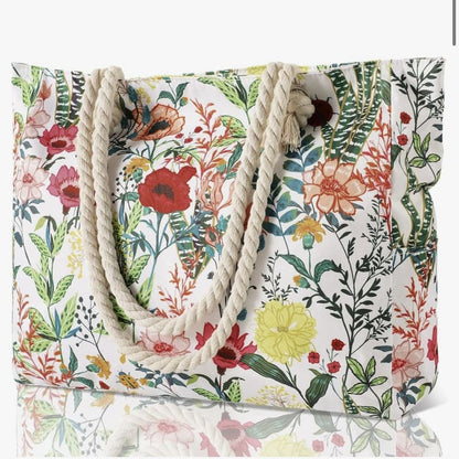 Printed polyester shoulder bag with floral pattern, braided rope handles, open top
