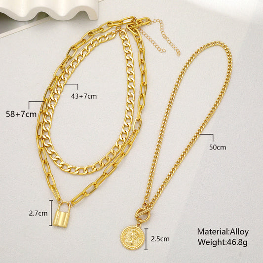 Gold chain necklace with measurements and material details on a white background