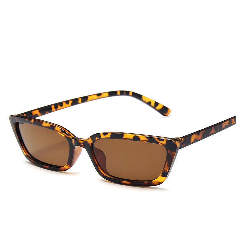 Tortoise leopard rectangle resin sunglasses with amber-brown lenses