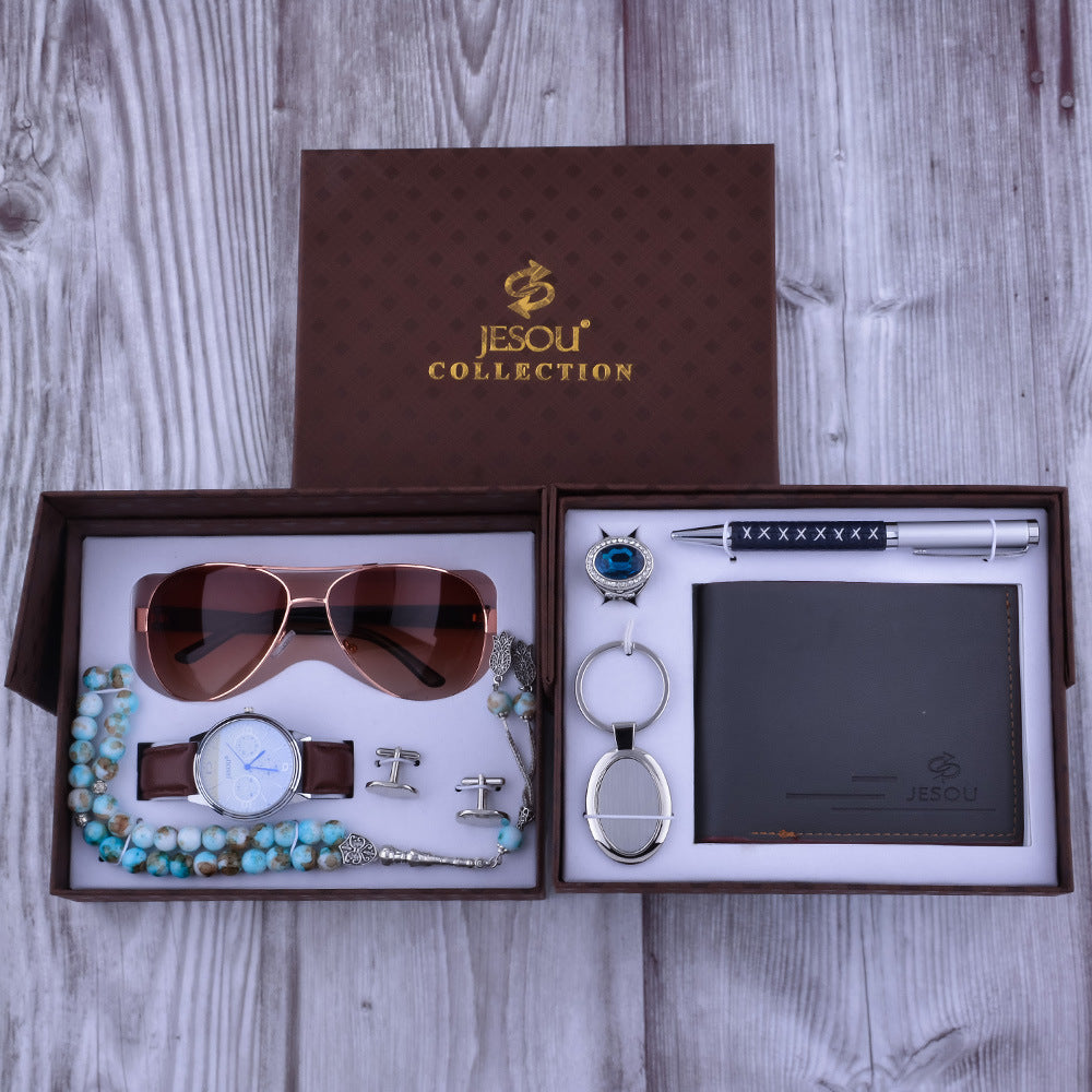 Men's brown gift set contents: sunglasses, watch, keychain, and wallet card holder