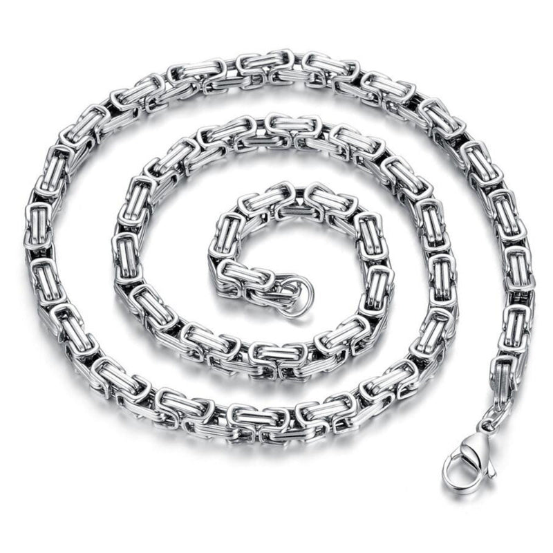 Silver chain necklace on a white background