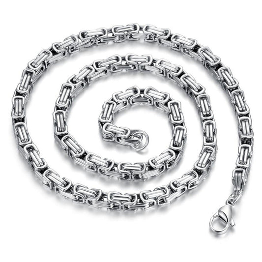 Silver chain necklace on a white background