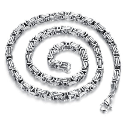 Silver chain necklace on a white background