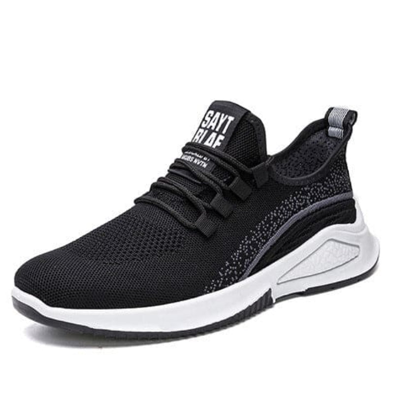 Women’s mesh sneakers, black upper with strap detail and white rubber outsole