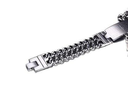 Stainless steel chain bracelet on a white background
