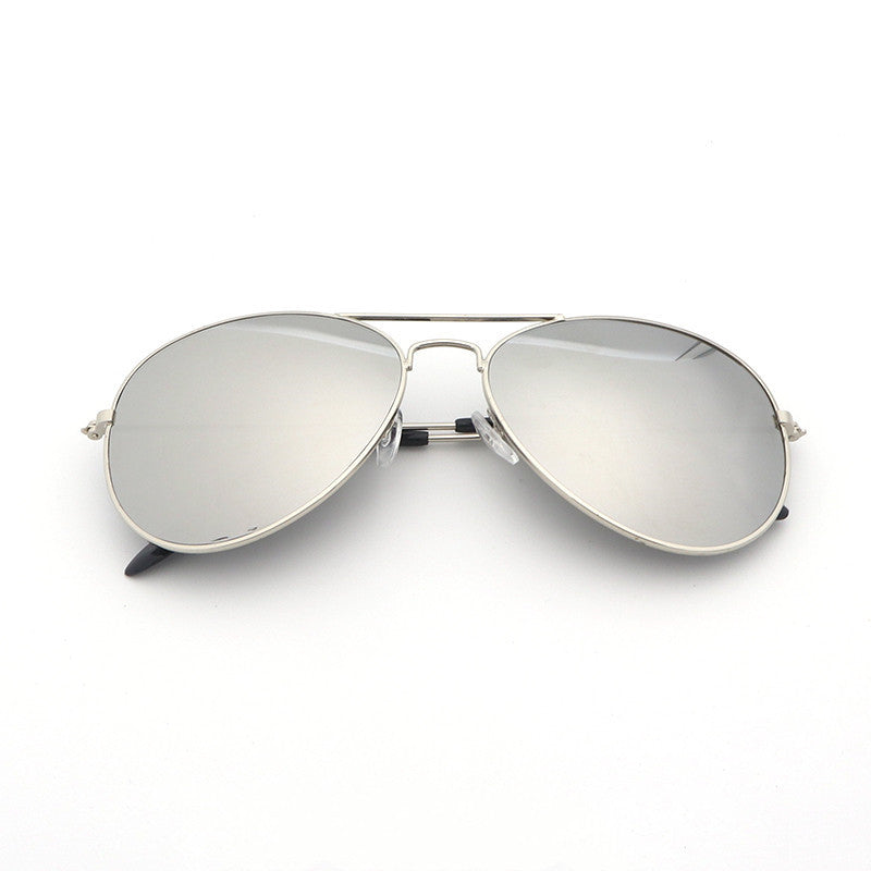 Unisex sunglasses with silver frame and light gray mirrored lenses, oval aviator style.