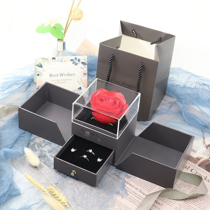 Charcoal rose jewelry gift box with clear rose compartment, folding side trays, and jewelry drawer
