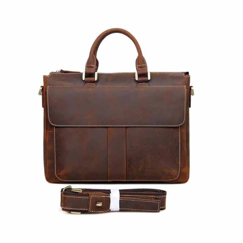 Dark brown leather crossbody bag with flap front, top handles, and attached strap.