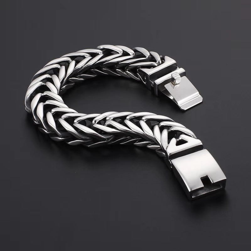 Interlocking chain bracelet with box clasp and hinged end links, polished silver