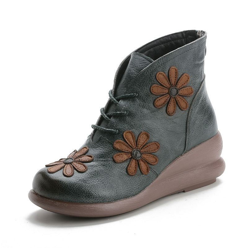 Greenish dark gray leather ankle boot with lace-up and tan flower embroidery