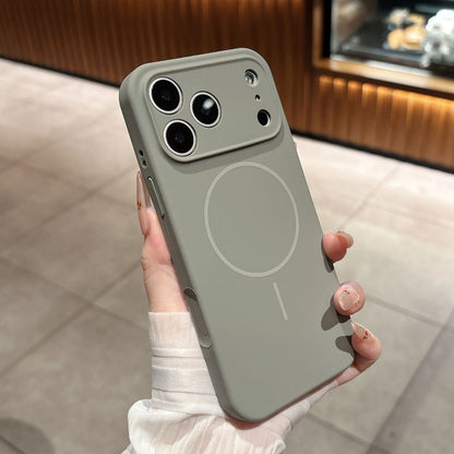 Person holding a light gray phone case with a minimalist design.